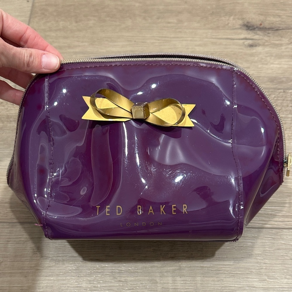 Ted Baker London Glossy Purple Oxblood Cosmetic Bag with Gold Bow makeup pouch